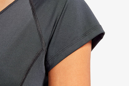 KYMIRA women's infrared performance cap sleeve top in an outdoor setting, demonstrating its versatility for workouts and casual wear, combining style with recovery benefits.