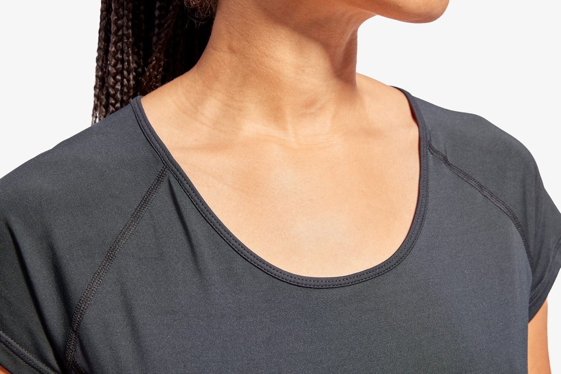 Elegant KYMIRA Women's Infrared Performance Cap Sleeve Top in slim fit, showcasing modern athletic wear designed for optimal recovery and performance, available in sizes XS-XL.