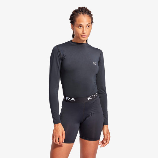 Elegant Women's IR50 Infrared Long Sleeve Performance Baselayer Top by KYMIRA, designed for optimal recovery and luxury comfort.