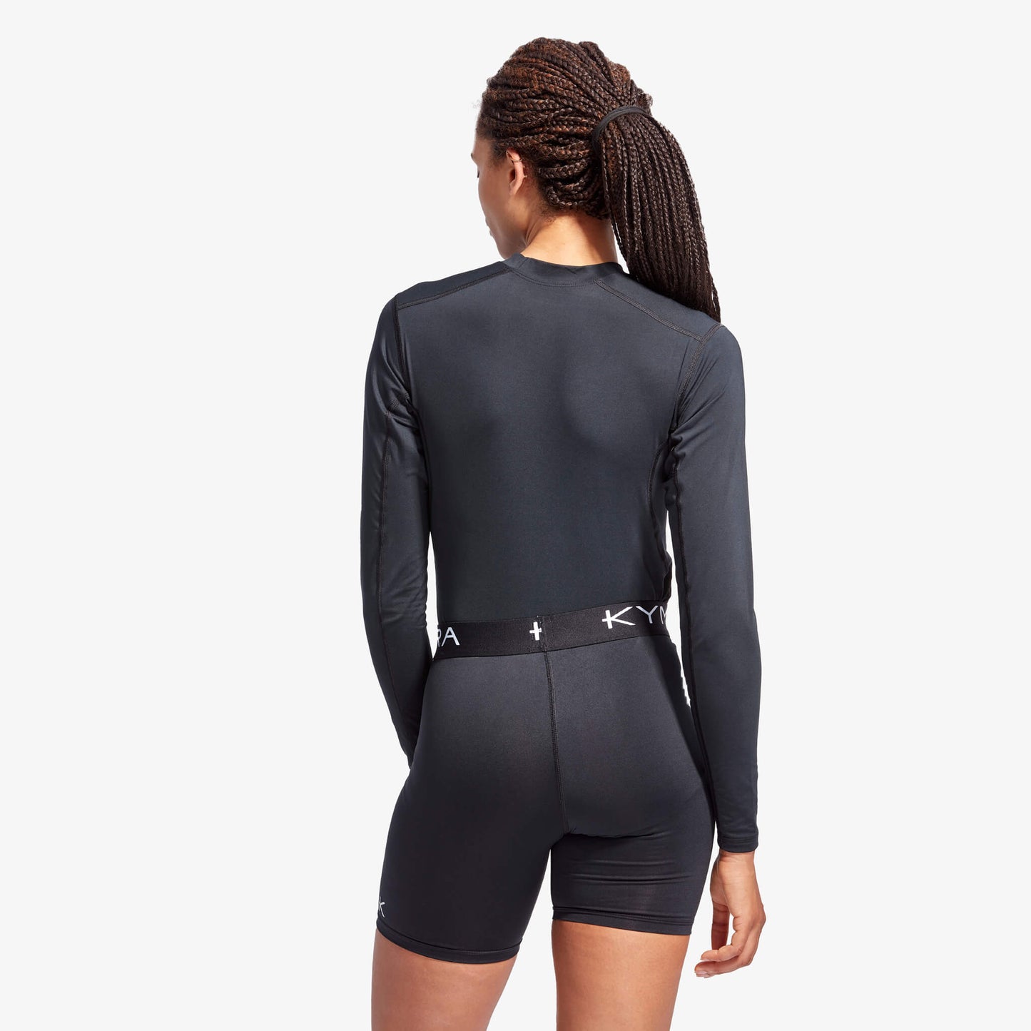 Close-up view of the KYMIRA Women's IR50 Long Sleeve Baselayer Top, showcasing premium fabric and exquisite stitching for performance.