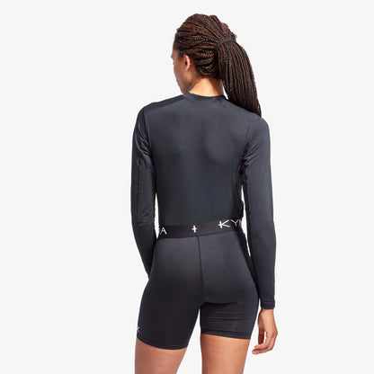 Close-up view of the KYMIRA Women's IR50 Long Sleeve Baselayer Top, showcasing premium fabric and exquisite stitching for performance.