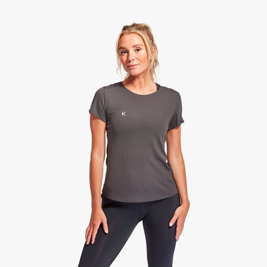 KYMIRA Women's Infrared Performance T-Shirt showcasing pleated back detail, designed for ultimate flexibility and breathability.