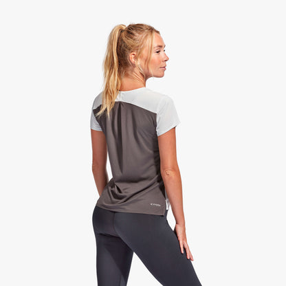 Luxurious KYMIRA Women's Infrared Performance T-Shirt showcasing pleated back design for enhanced flexibility, perfect for high-intensity workouts.