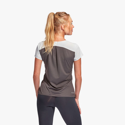 KYMIRA Women's t-shirt in dynamic action, demonstrating the pleated back for premium freedom of movement during workouts.