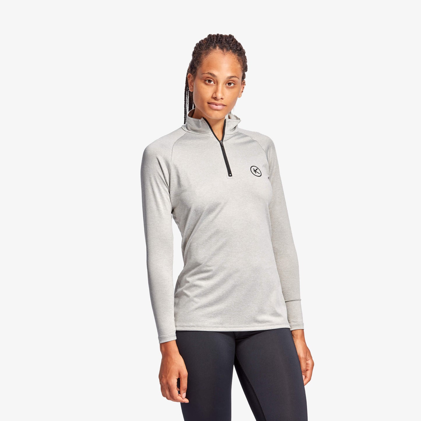 Luxurious KYMIRA Women's Infrared 1/4 Zip Long Sleeve Performance Top, showcasing an ergonomic fit ideal for enhancing athletic performance and recovery.