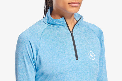 Luxurious KYMIRA Women's Infrared 1/4 Zip Long Sleeve Top, a stylish blend of performance technology and elegant aesthetics.