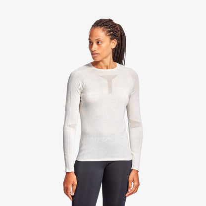Luxury Women's KYMIRA Infrared Merino Ecoknit Baselayer Top, expertly crafted for ultimate performance and comfort, featuring seamless design and eco-friendly materials.