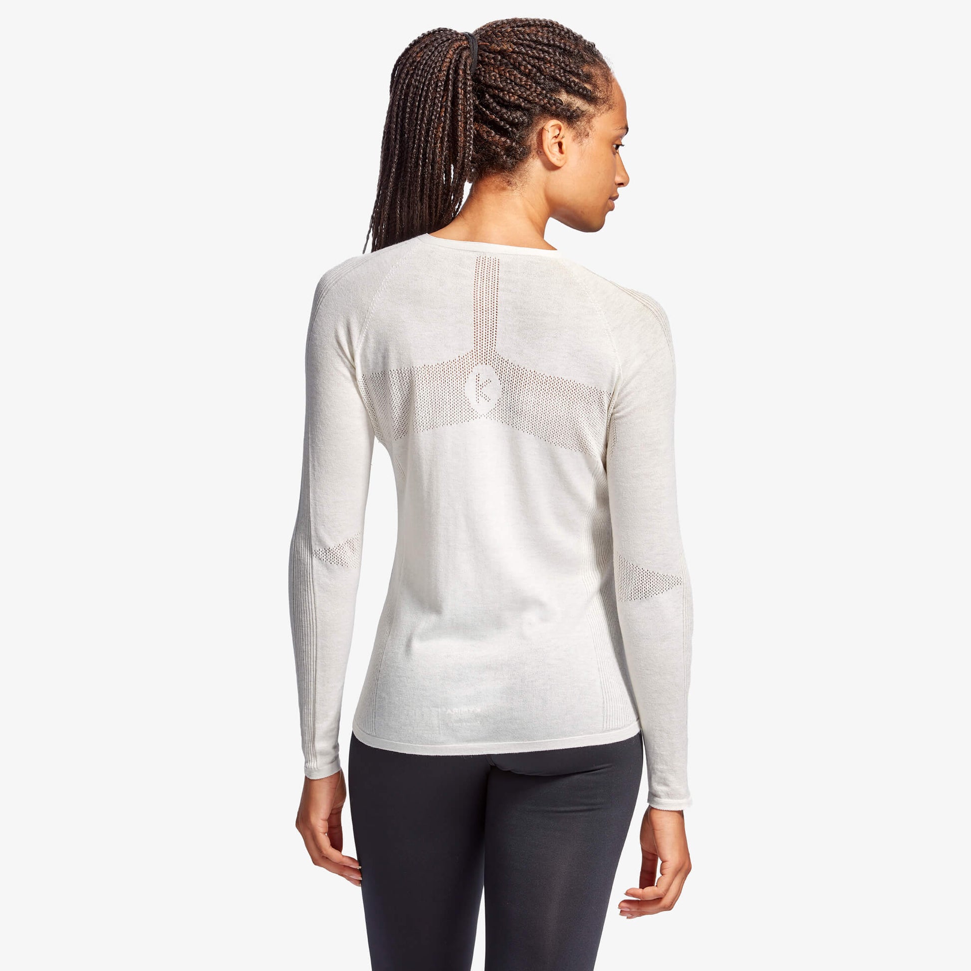 Elegant Women's KYMIRA Infrared Merino Ecoknit Baselayer Top LS in luxurious seamless design, perfect for cool weather activities.