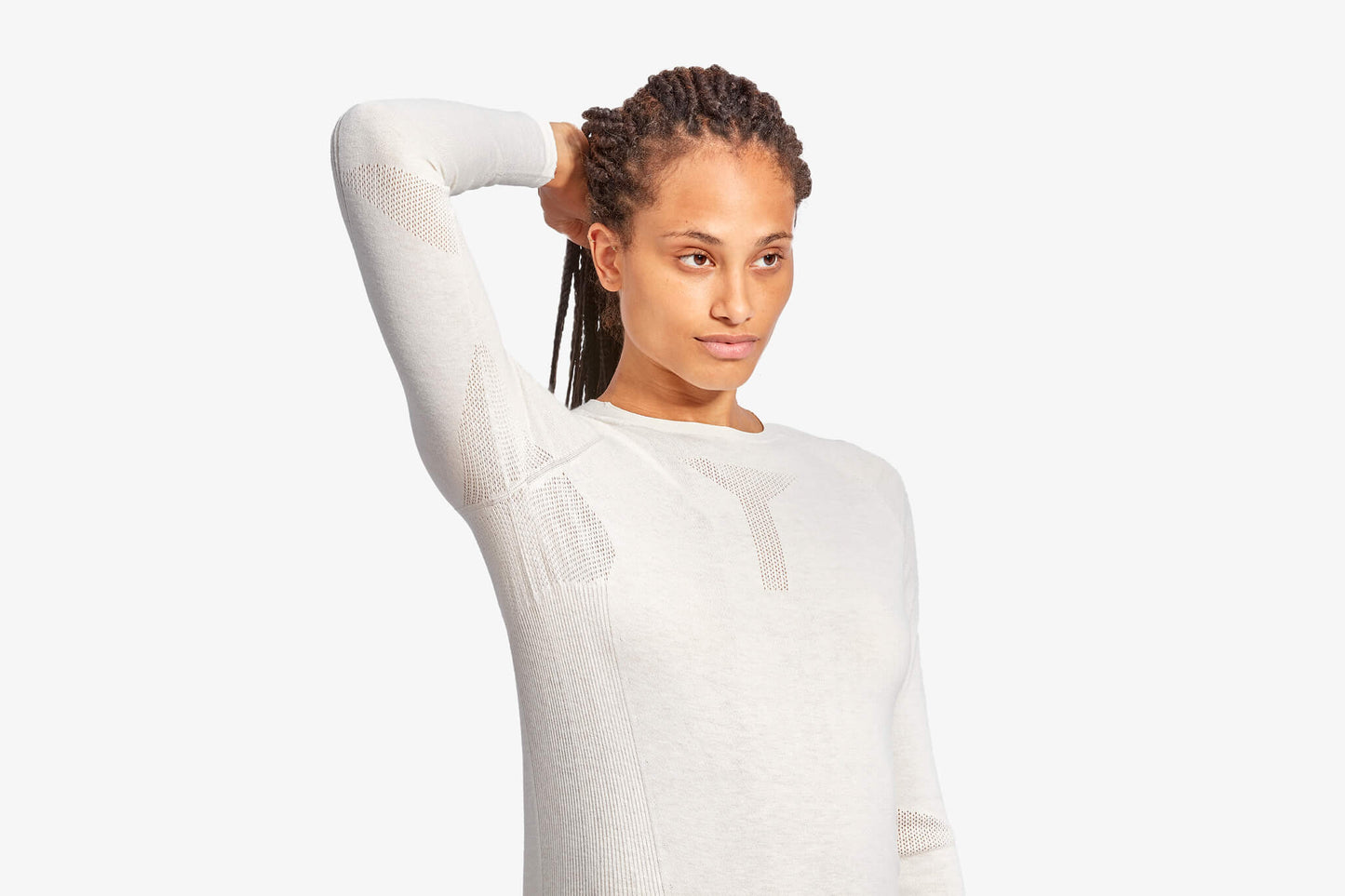 Close-up of the high-quality fabric of the Women's KYMIRA Infrared Merino Ecoknit Baselayer Top LS, showcasing breathability and comfort for premium performance.
