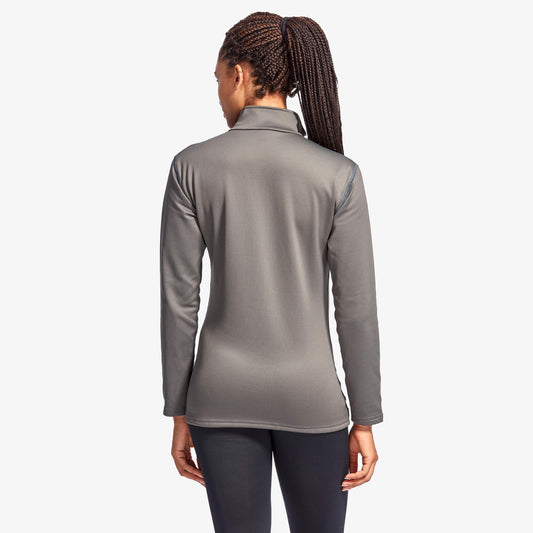Luxury women's infrared half zip fleece by KYMIRA, showcasing elegant design and high-performance KYnergy technology for warmth and recovery.
