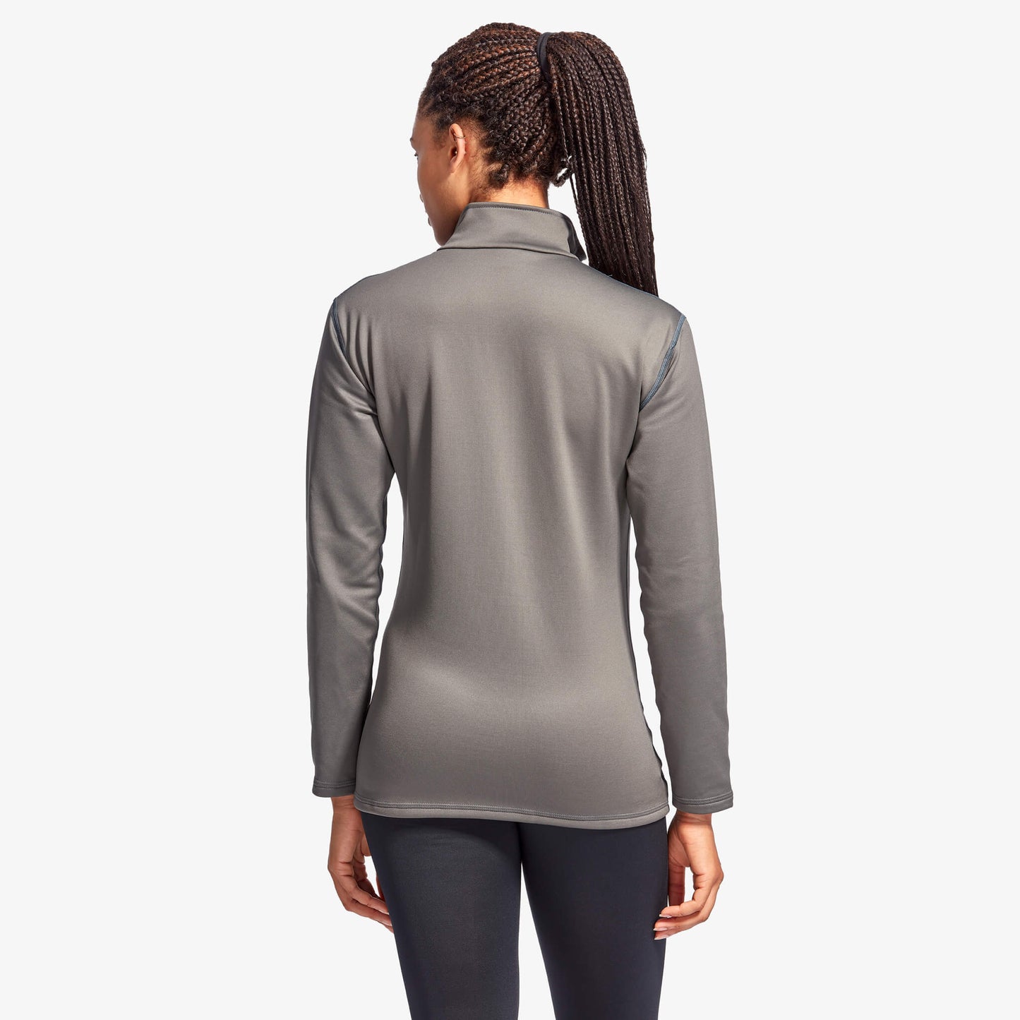Luxury women's infrared half zip fleece by KYMIRA, showcasing elegant design and high-performance KYnergy technology for warmth and recovery.