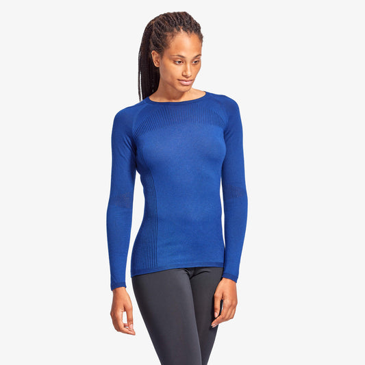 Luxury Women's Infrared Merino Wool Baselayer Top by KYMIRA showcasing the elegant design and cooling zones for enhanced comfort.