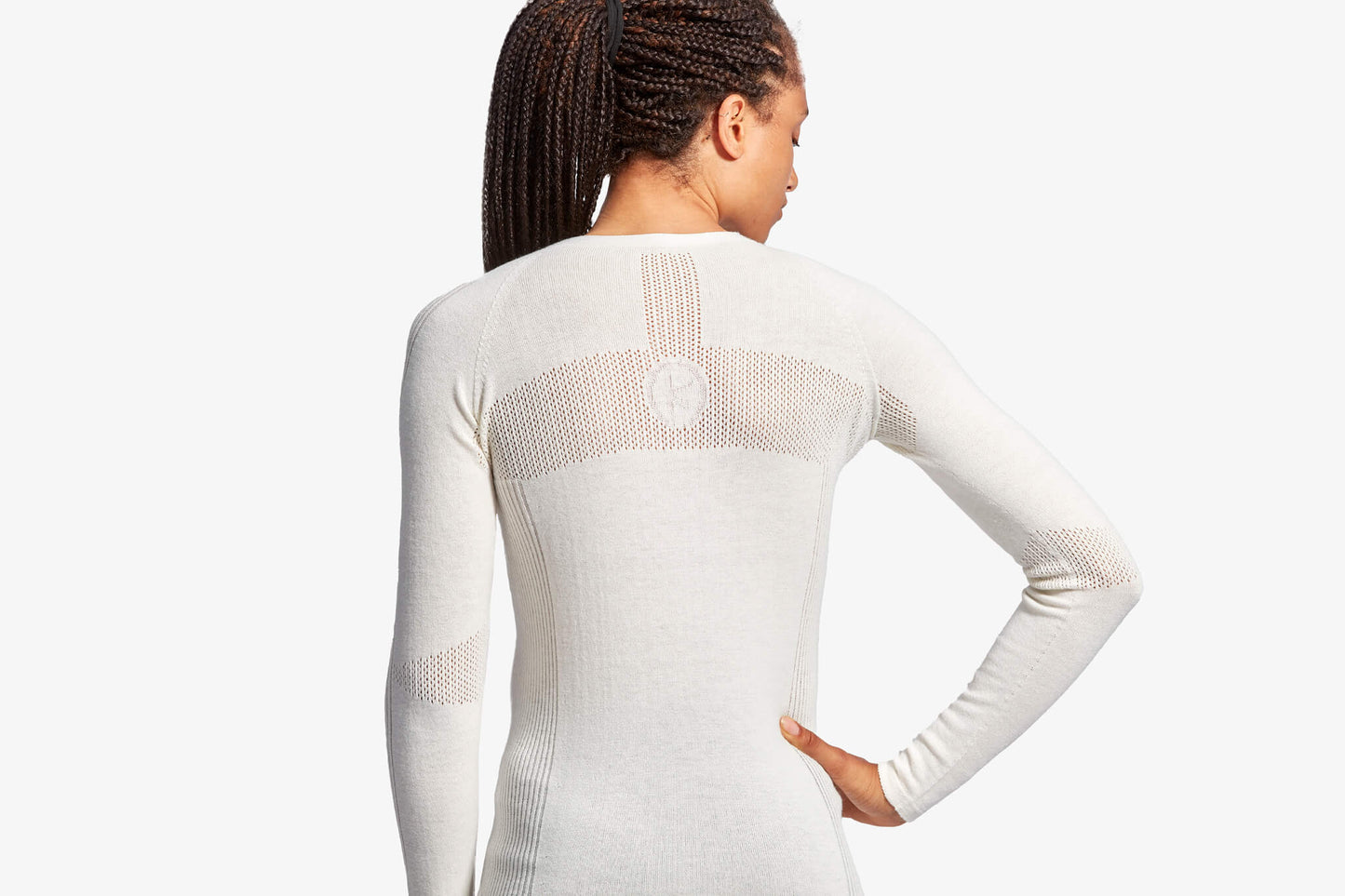 Sustainable KYMIRA women's luxury merino wool top, designed to contour the body while providing warmth and style in winter.