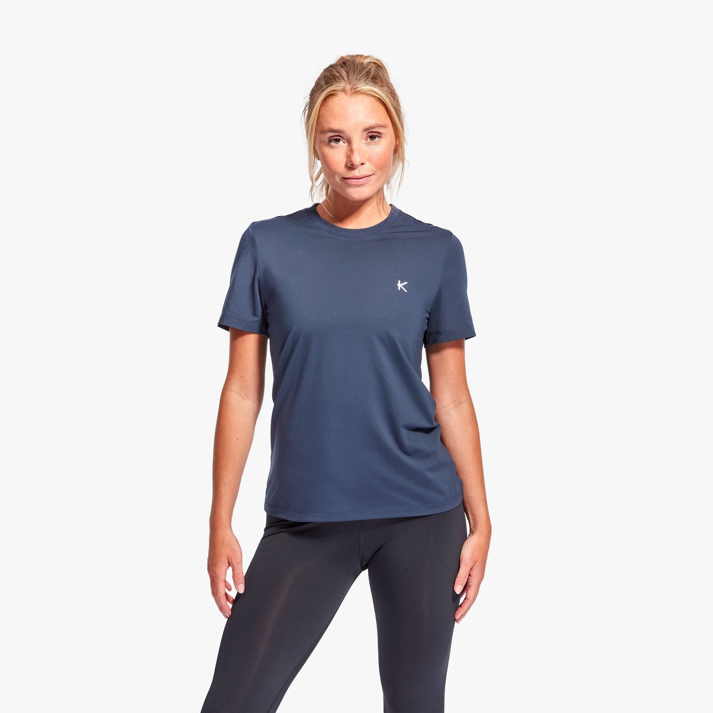 Women modelling the KyMIRA Luxury Infrared Recovery T-Shirt, highlighting the loose fit and bold design for stylish comfort.
