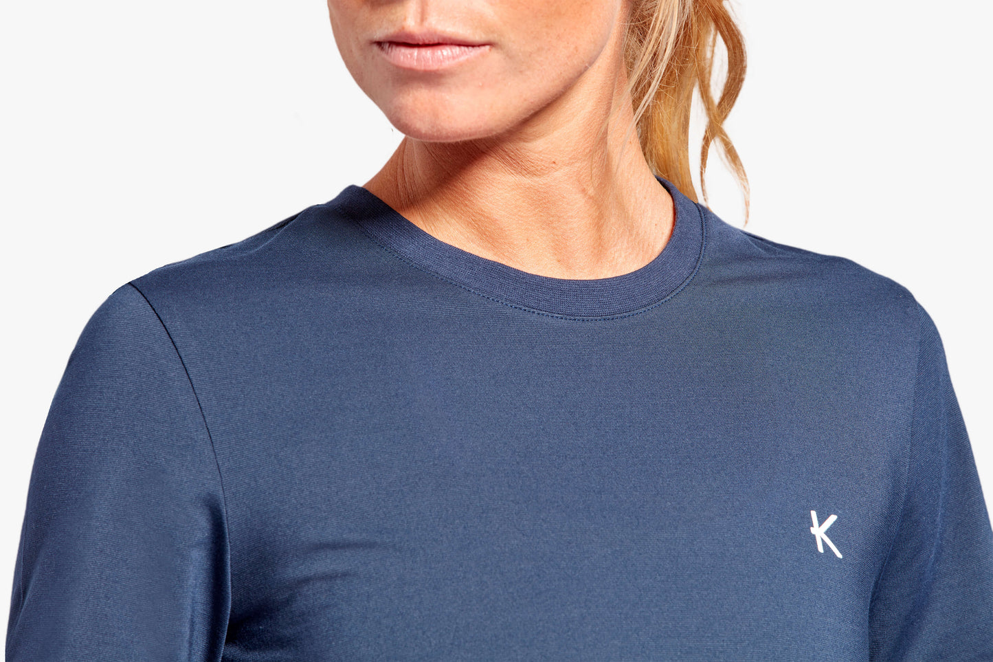 Close-up of KYMIRA Women's Recharge Recovery T-Shirt, featuring a loose fit design in vibrant colours for maximum comfort.