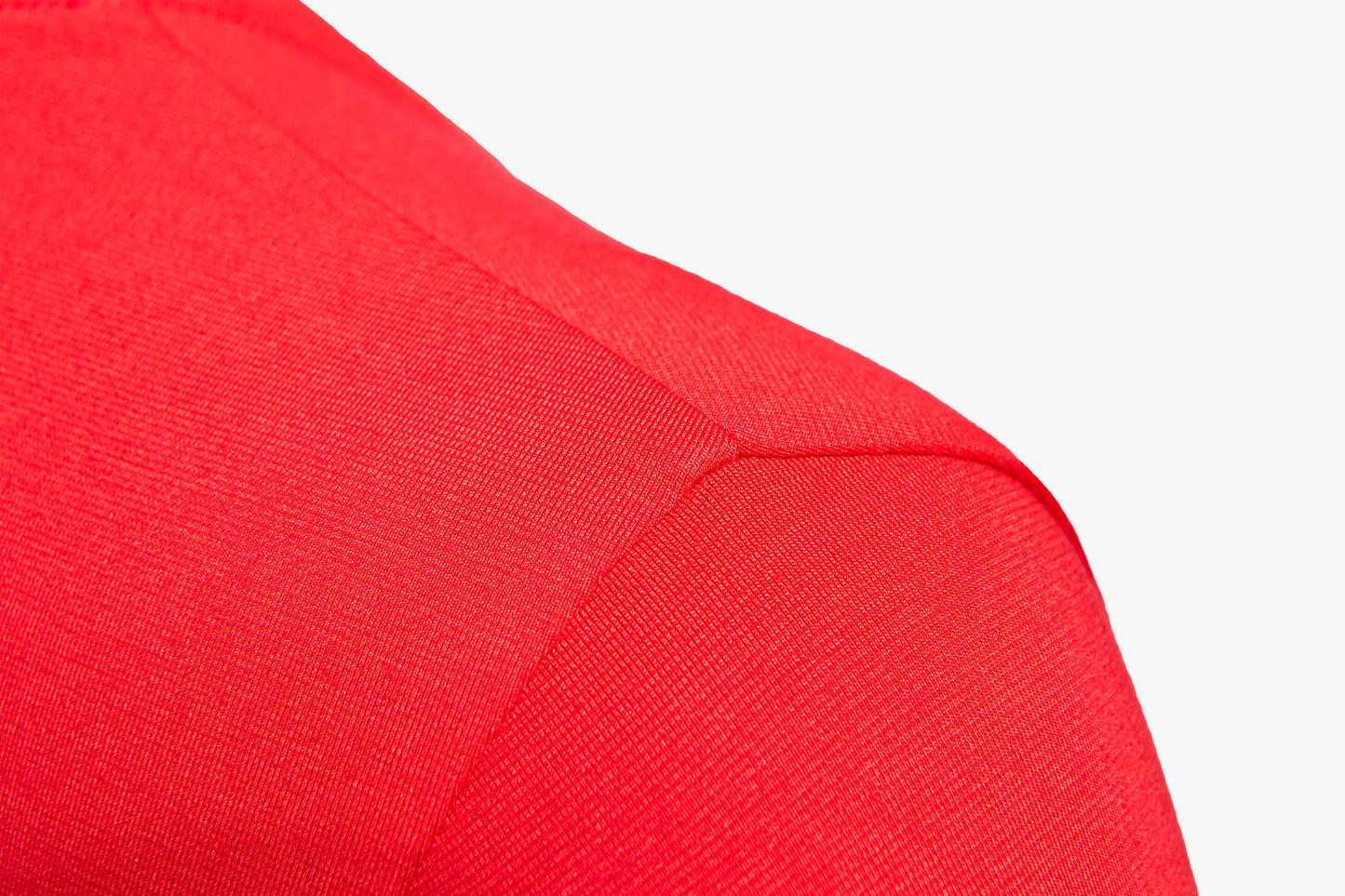 Close-up of the soft KyMIRA lightweight fabric of the Women's Recharge Recovery T-Shirt, showcasing its vibrant colour and luxurious texture.