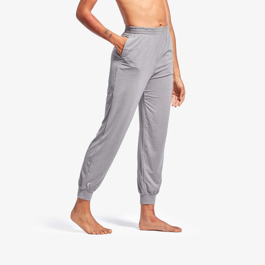 Elegant women's cuffed jogger sleepwear bottoms from KYMIRA, designed with infrared technology for enhanced recovery and comfort, ideal for a restful night's sleep.