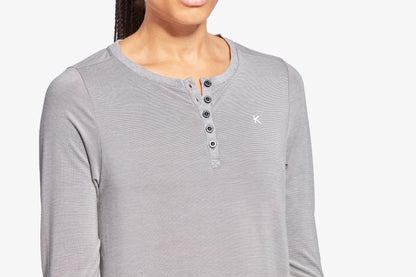 KYMIRA Women's Infrared Recovery Henley Sleepwear Top displayed with fabric details; blends Tencel™ and Celliant® for enhanced sleep quality and recovery benefits.
