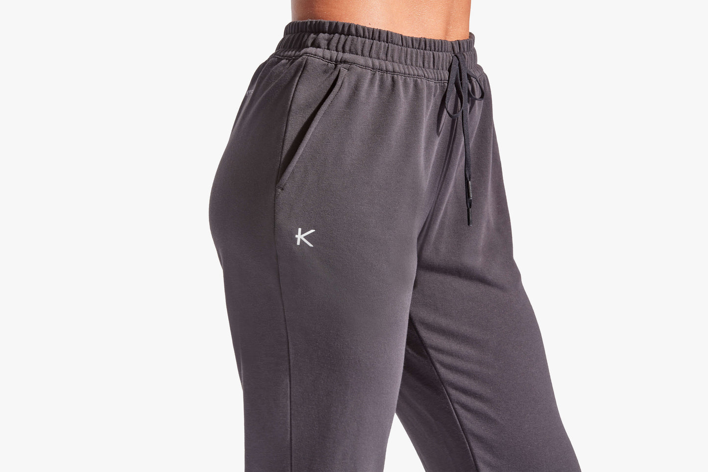 KYMIRA luxury women's tracksuit bottoms with advanced Kynergy technology, ensuring optimal comfort and leg recovery after workouts.