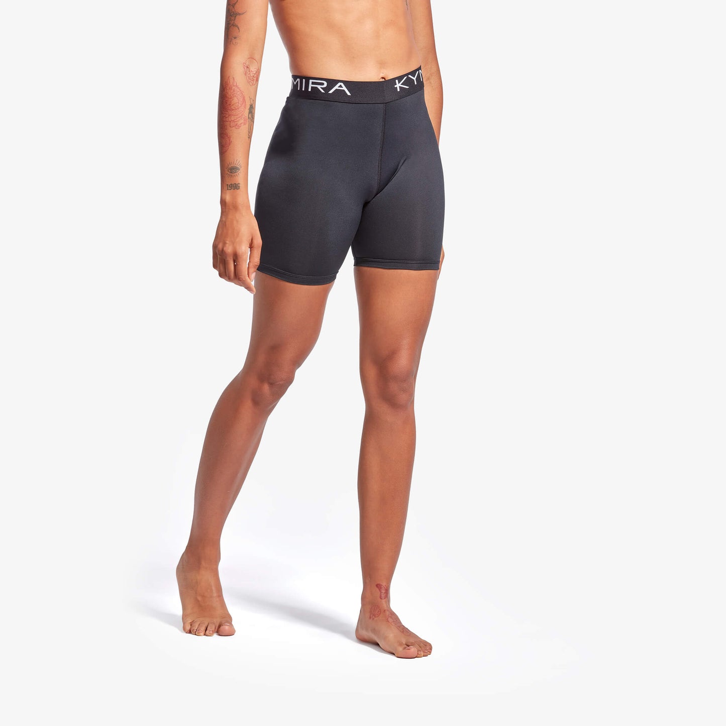 Close-up view of KYMIRA Women's Infrared Performance Shorts highlighting the elastic waistband and breathable material, perfect for stylish and effective training.