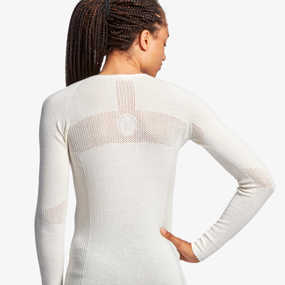 KYMIRA's luxury merino wool baselayer top for women, ideal for layering or solo wear, combining elegant design and innovative infrared technology.