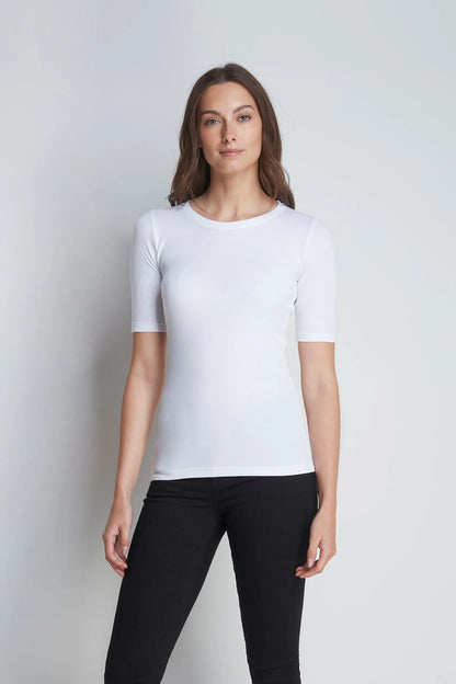 Model wearing women’s premium half sleeve crew neck t-shirt, perfectly styled for casual outings and sophisticated layering, available from Lavender Hill Clothing.