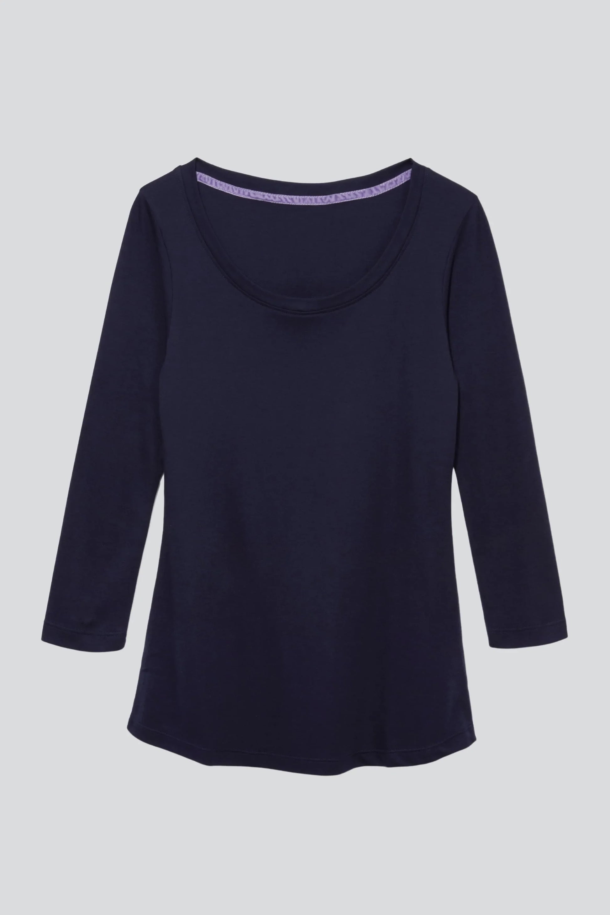Woman wearing the luxurious 3/4 sleeve t-shirt, demonstrating its comfortable fit and stylish design for any occasion.