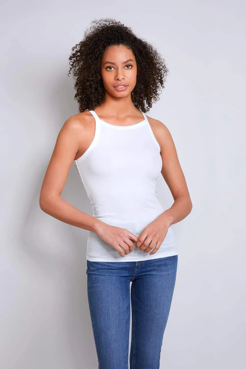 Elegant Women's High Neck Tank Top in versatile colour, crafted from TENCEL™ Lyocell for breathability and comfort, ideal for layering under blazers or wearing solo.