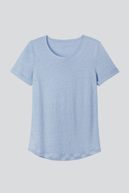 Model wearing a classic crew neck women's linen t-shirt, ideal for both casual and smart-casual outfits.
