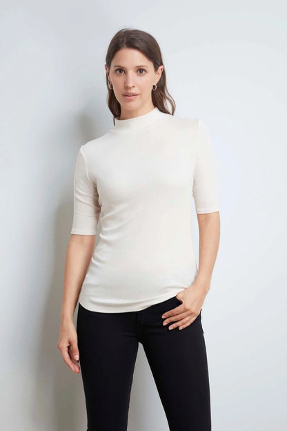 Close-up of the women's Mock Neck Micro Modal Top, highlighting its premium TENCEL™ Modal fabric and sophisticated ribbed texture.