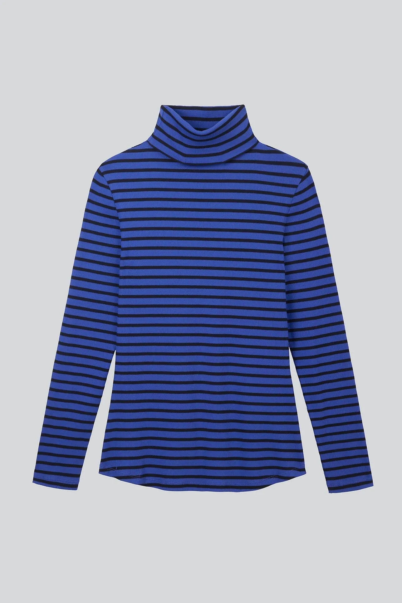 Women's Striped Long Sleeve Cotton Roll Neck Top in a stylish setting, highlighting its sophistication and comfort for transitional weather.