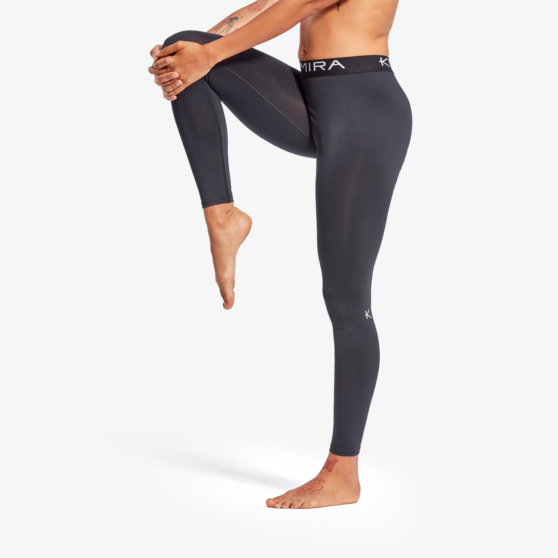 KYMIRA women's infrared leggings on display, demonstrating their sleek fit and functionality, tailored for an elite training experience.
