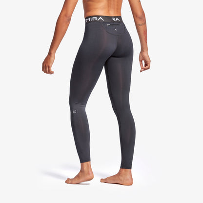 Elegant design of KYMIRA women's infrared performance leggings, showcasing fitted calves and flatlock stitching for superior comfort and style.