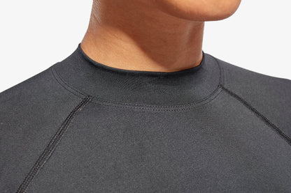 Close-up of KYMIRA's Women's Luxury Infrared Recovery Baselayer Top, highlighting its breathable fabric and durable construction, ideal for providing exceptional comfort during workouts.