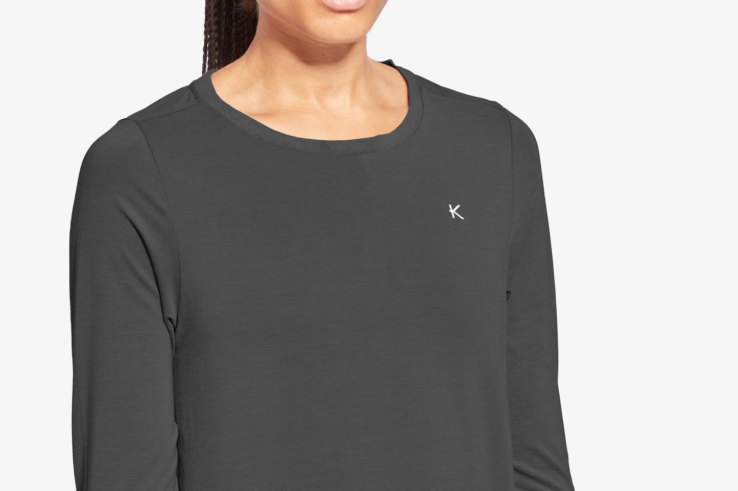Elegant KYMIRA Infrared Sleepwear Crew Neck Top, designed with advanced KYnergy technology for increased blood circulation and local tissue oxygenation, available in sizes XS-XL.