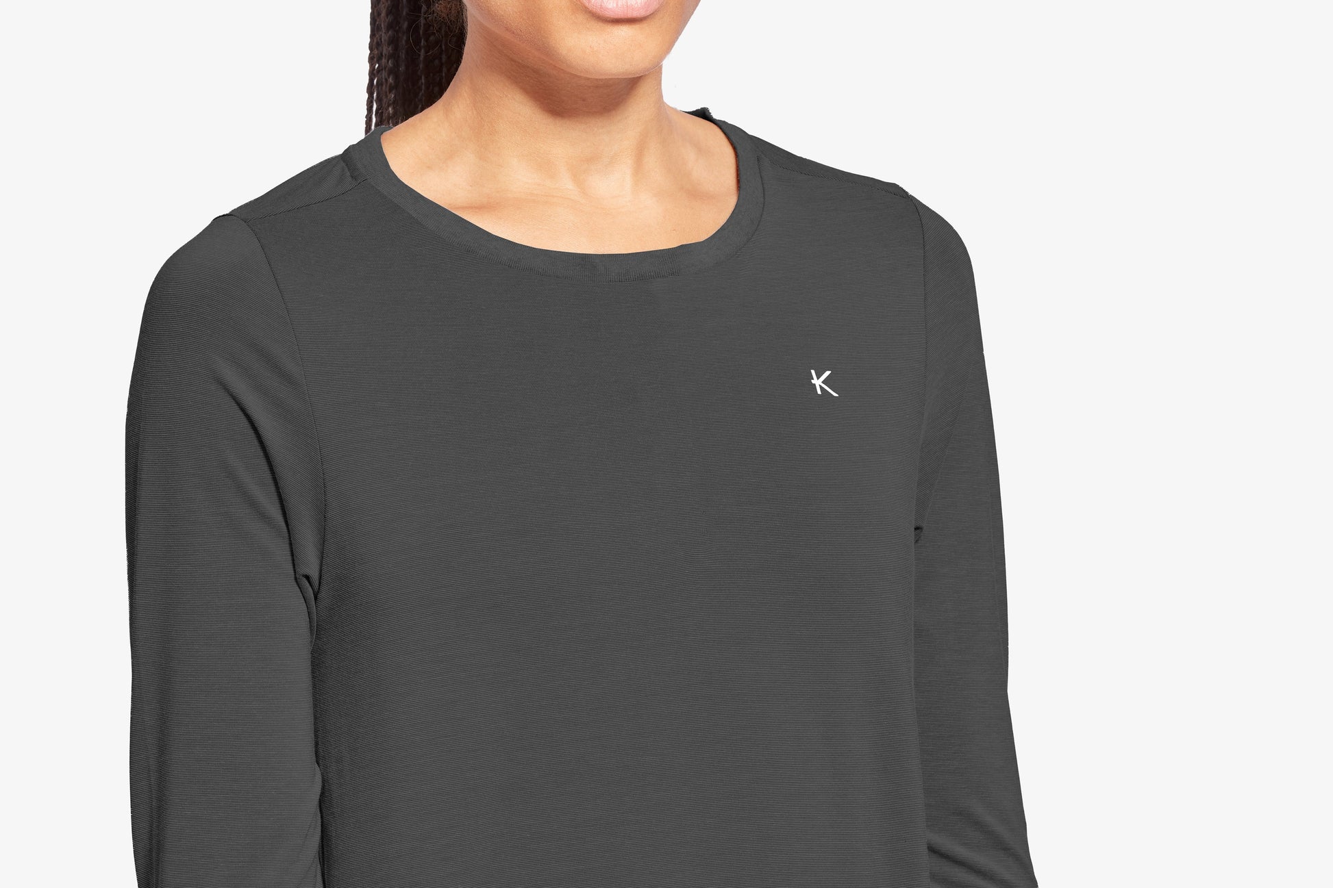 Elegant KYMIRA Infrared Sleepwear Crew Neck Top, designed with advanced KYnergy technology for increased blood circulation and local tissue oxygenation, available in sizes XS-XL.