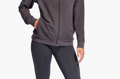 Luxe women’s Recharge tracksuit top by KYMIRA, offering a perfect fit from sizes S to XL, enhancing recovery through innovative fabric technology.