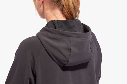 Luxurious women's Recharge infrared recovery tracksuit top with full zip and hood by KYMIRA, perfect for warmth and enhanced recovery during training or casual outings.