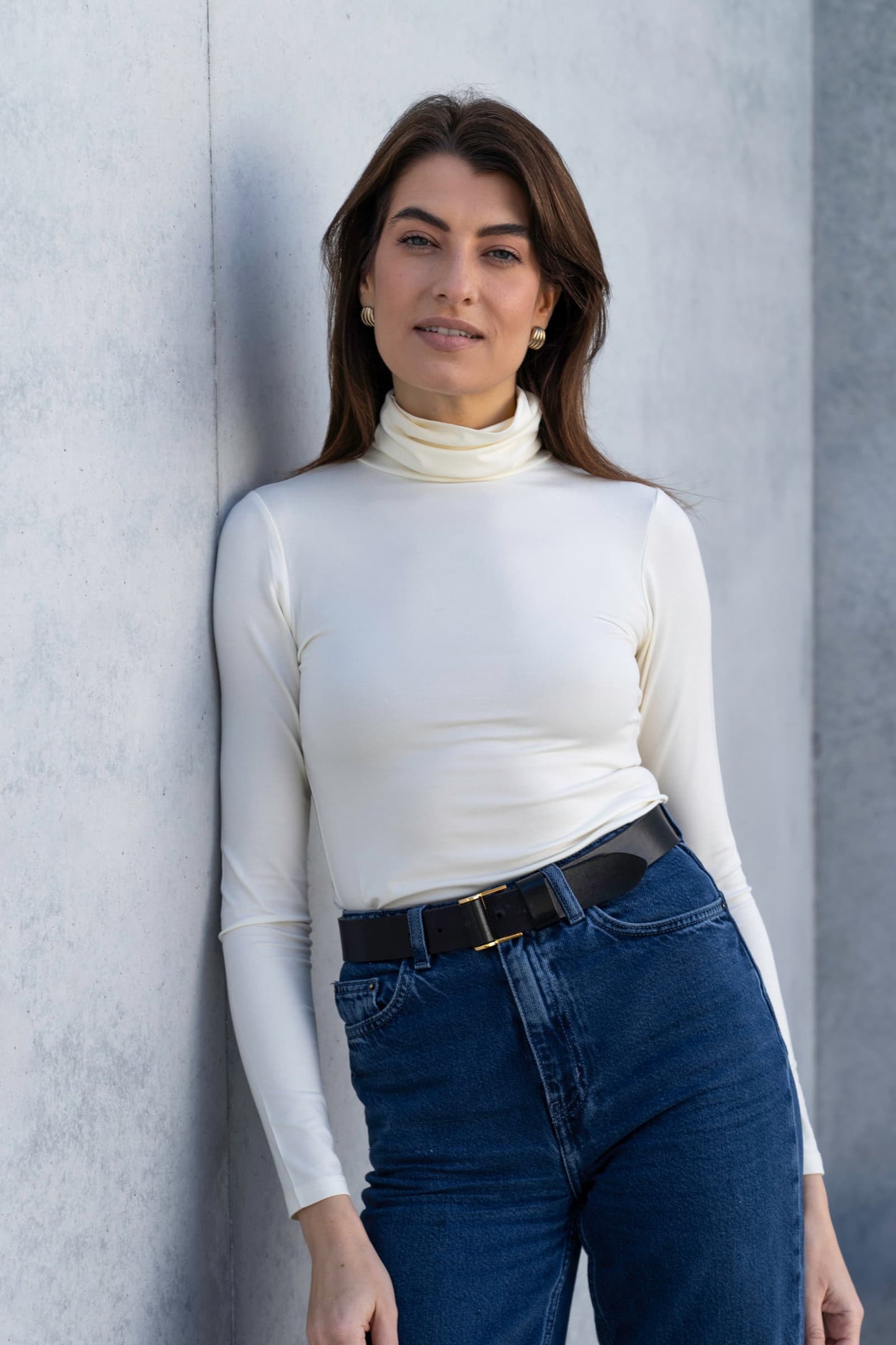 Luxurious Women's Roll Neck Micro Modal Top featuring breathable softness and sophisticated design, ideal for transitional weather.
