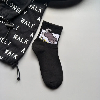 Stylish Hip Hop Long Socks for Women & Girls featuring a playful cartoon cat design in black, made from a comfy cotton and polyester blend.