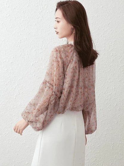 Model wearing the Elegant Women's Chiffon Blouse in M-4XL by Dazzling Dreams Studio, perfect for both formal and casual occasions, embodying grace and elegance.