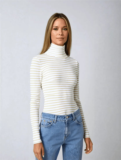 Elegant women's long sleeve cotton roll neck top displayed with tailored trousers, showcasing a polished, luxurious look.