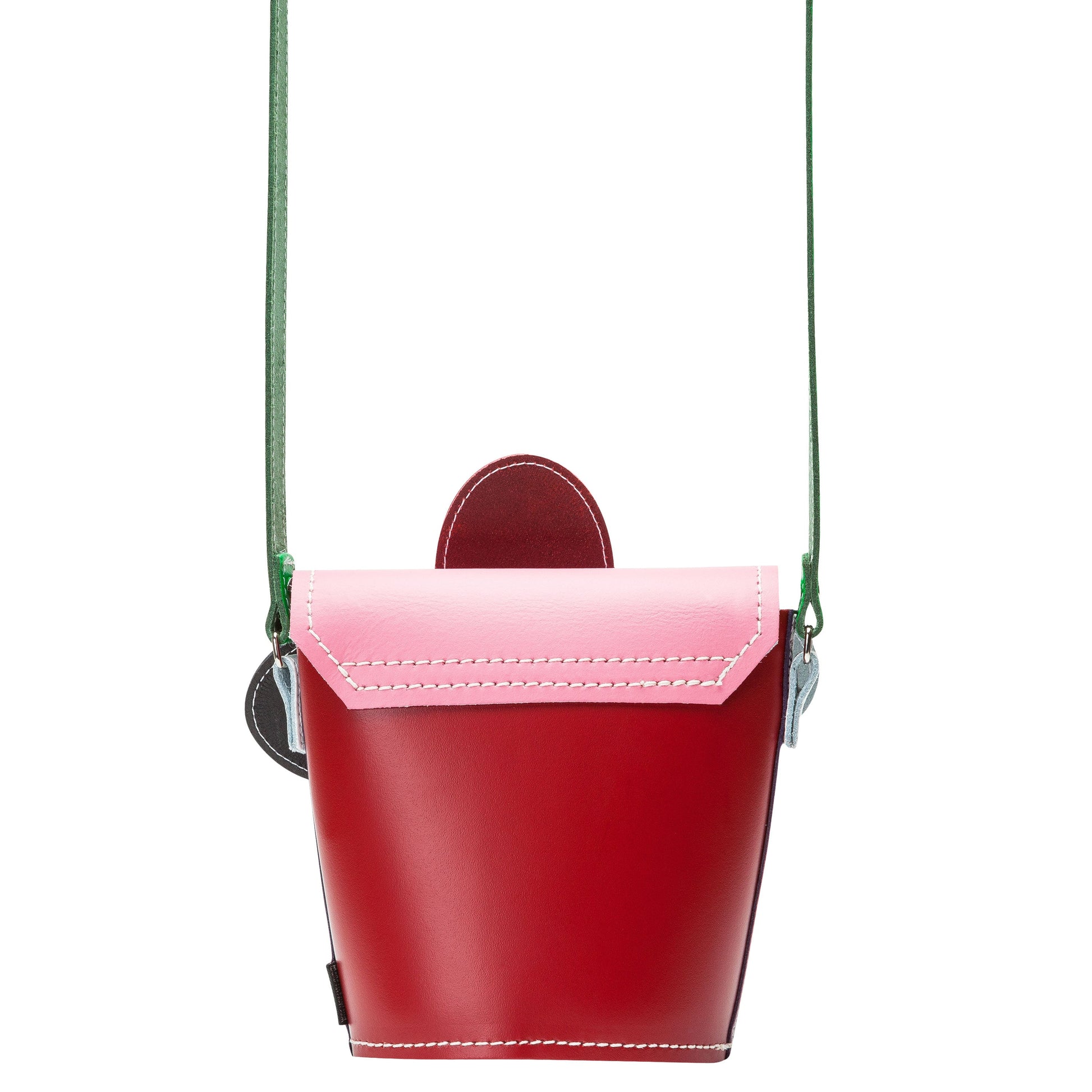 Interior view of the Handmade Leather Daisy Barrel Bag with personalized engraving option on matching leather tab.