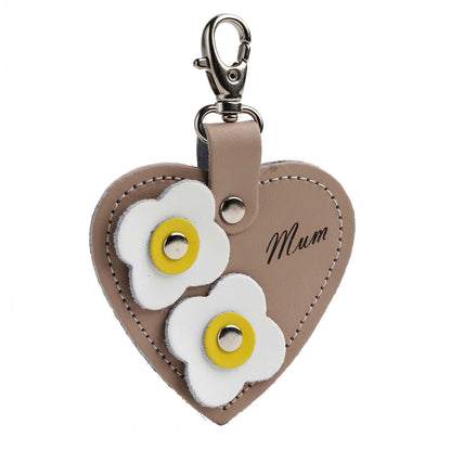 Luxurious leather love heart bag charm by Zatchels, featuring 'Mum' engraving and floral appliques, iced coffee colour, perfect accessory for gifting.