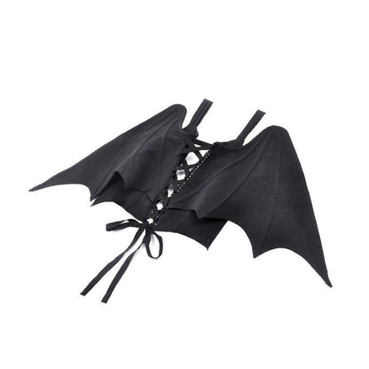 Close-up view of the asymmetric button-up front of the Dark in Love Vespertilio Vest, showing elegant ribbon lace-up detail.