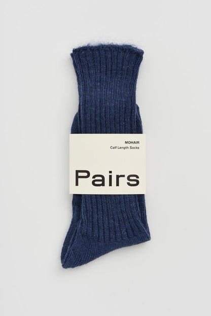 Elegant mohair socks in a rich texture, perfect for enhancing any winter wardrobe with luxury.