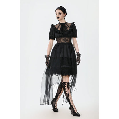 Model wearing the Dark in Love Ebon Rose dress with puff sleeves at a gothic tea party setting.
