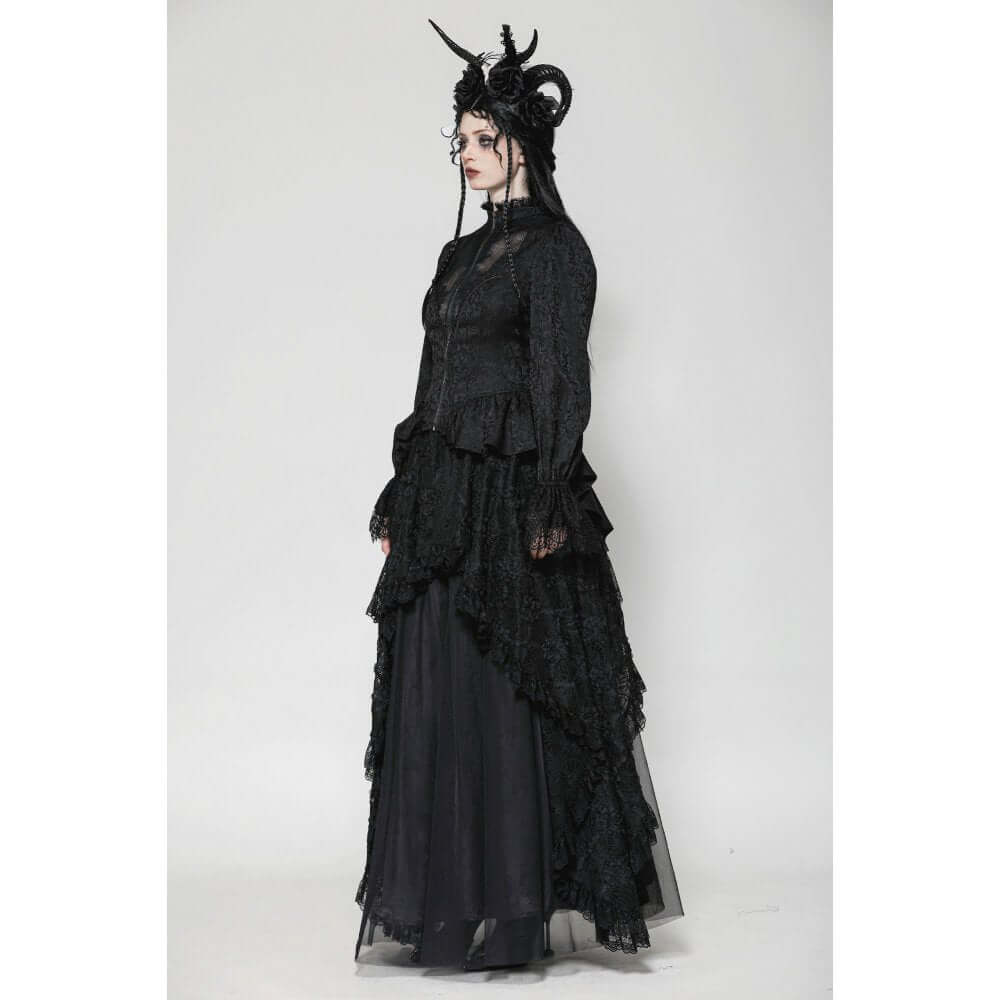 Model wearing the Felicity Gothic Tailcoat Shirt, exuding confidence with its unique bust sheer panel and sophisticated lace detailing.
