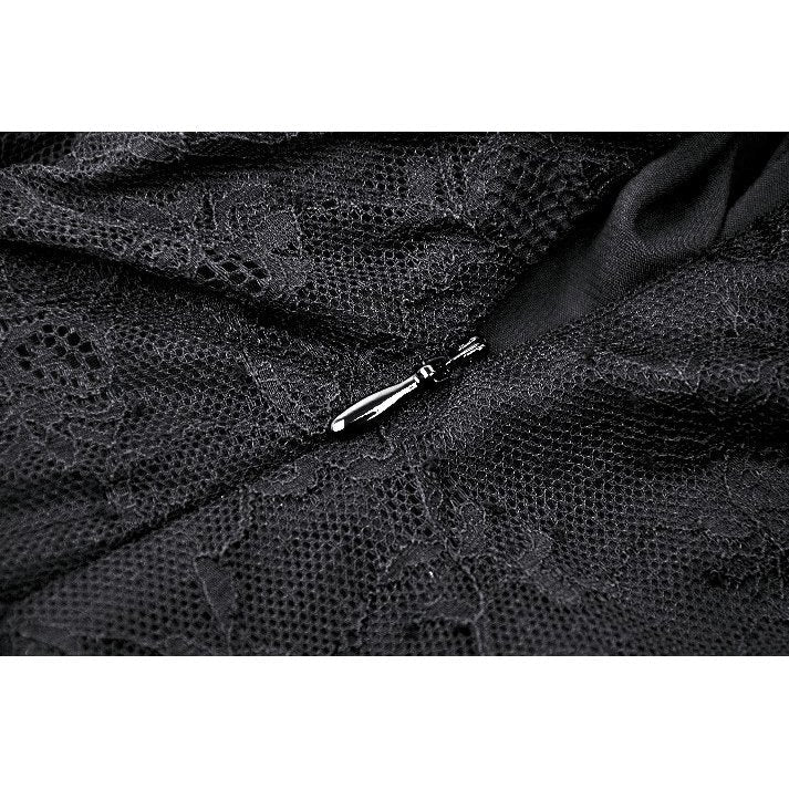 Close-up of the Merida Lace Tail Dress, highlighting the exquisite lace fabric and puff sleeves for a sophisticated touch.