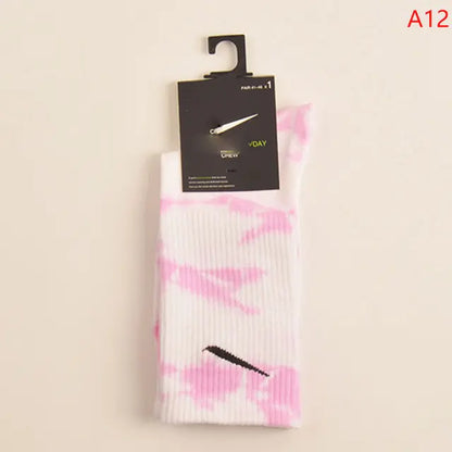 Luxurious Women's Tie-Dye Middle Tube Socks in pink and white, perfect for vibrant comfort and all-day style.